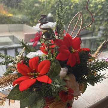 Red poinsettia Christmas arrangement